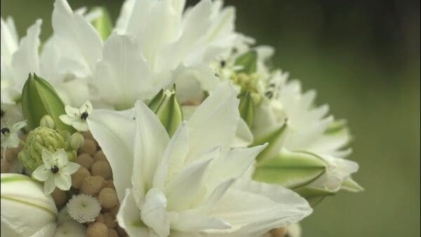 Elegant white lily bouquet arrangement.