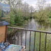 Plein air painting by riverside landscape.