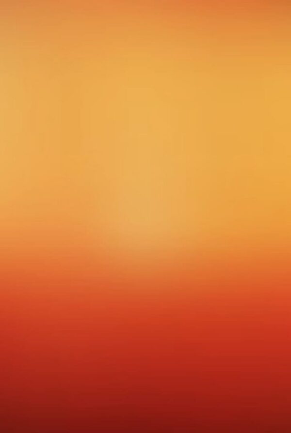 A blurred gradient background with warm orange and red tones.
