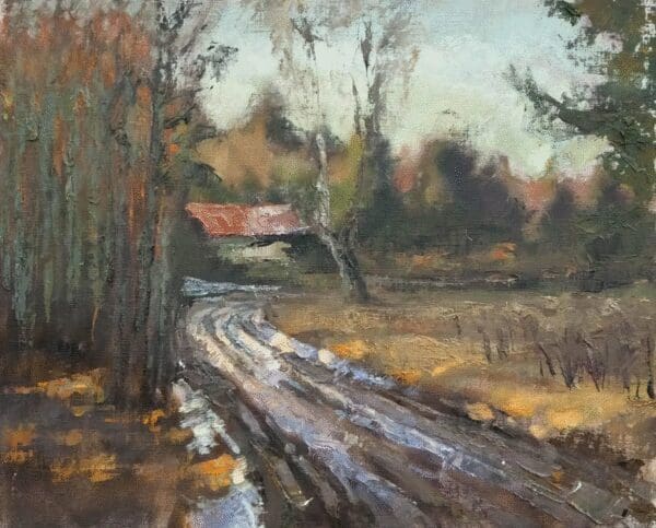 A rustic dirt road winds through a countryside landscape with autumn trees and a distant house.