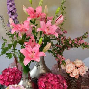 Pink lilies and roses floral arrangement